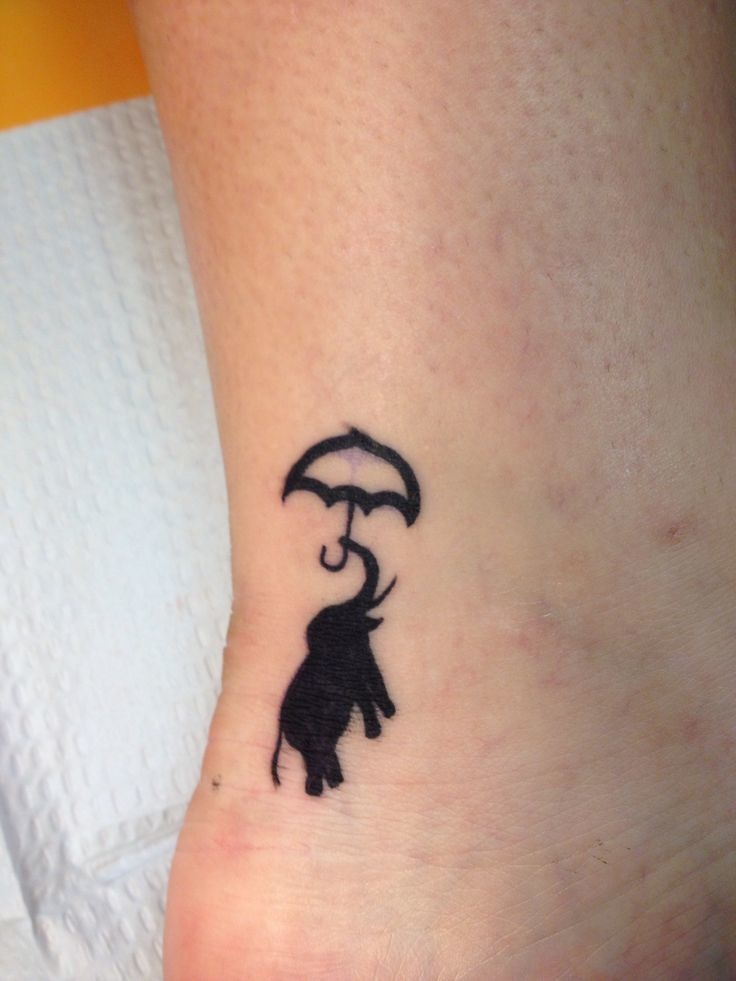 Elephant Outline Tattoo with Umbrella Tattoo Design