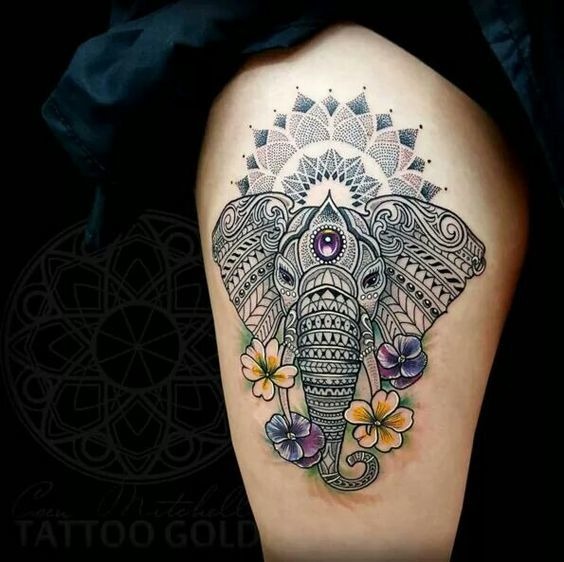 Lovely Elephant Thigh Tattoo with Flowers and Prized Gem Tattoo Design