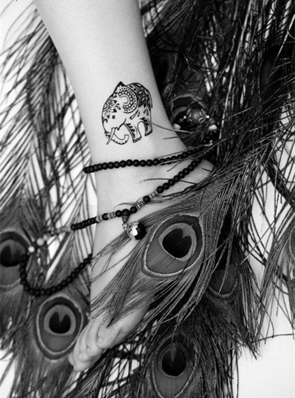 Small tattoosidea: A baby elephant tattoo on the leg Tattoo Design