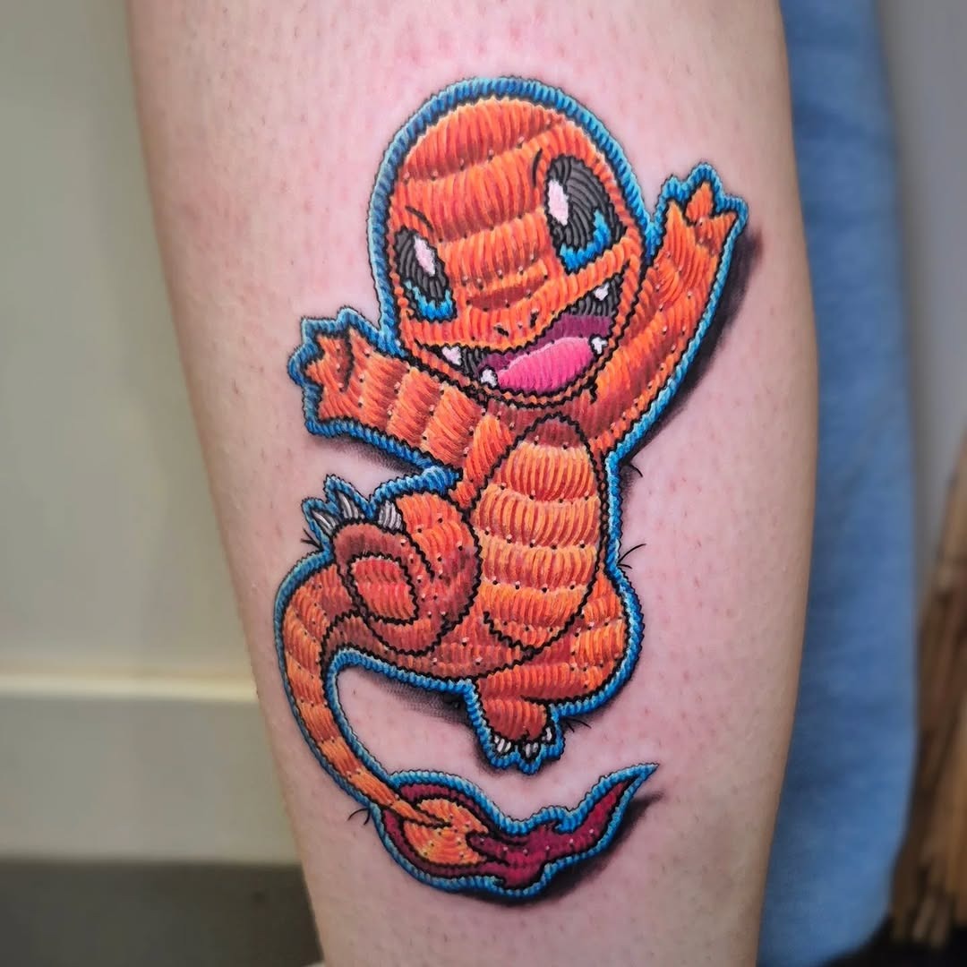 Adorable embroidery-style Charmander tattoo inspiration. Tattoo Design