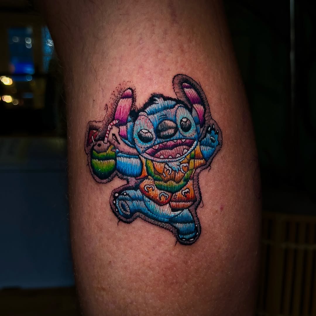 Colorful embroidery-style character tattoo design Tattoo Design