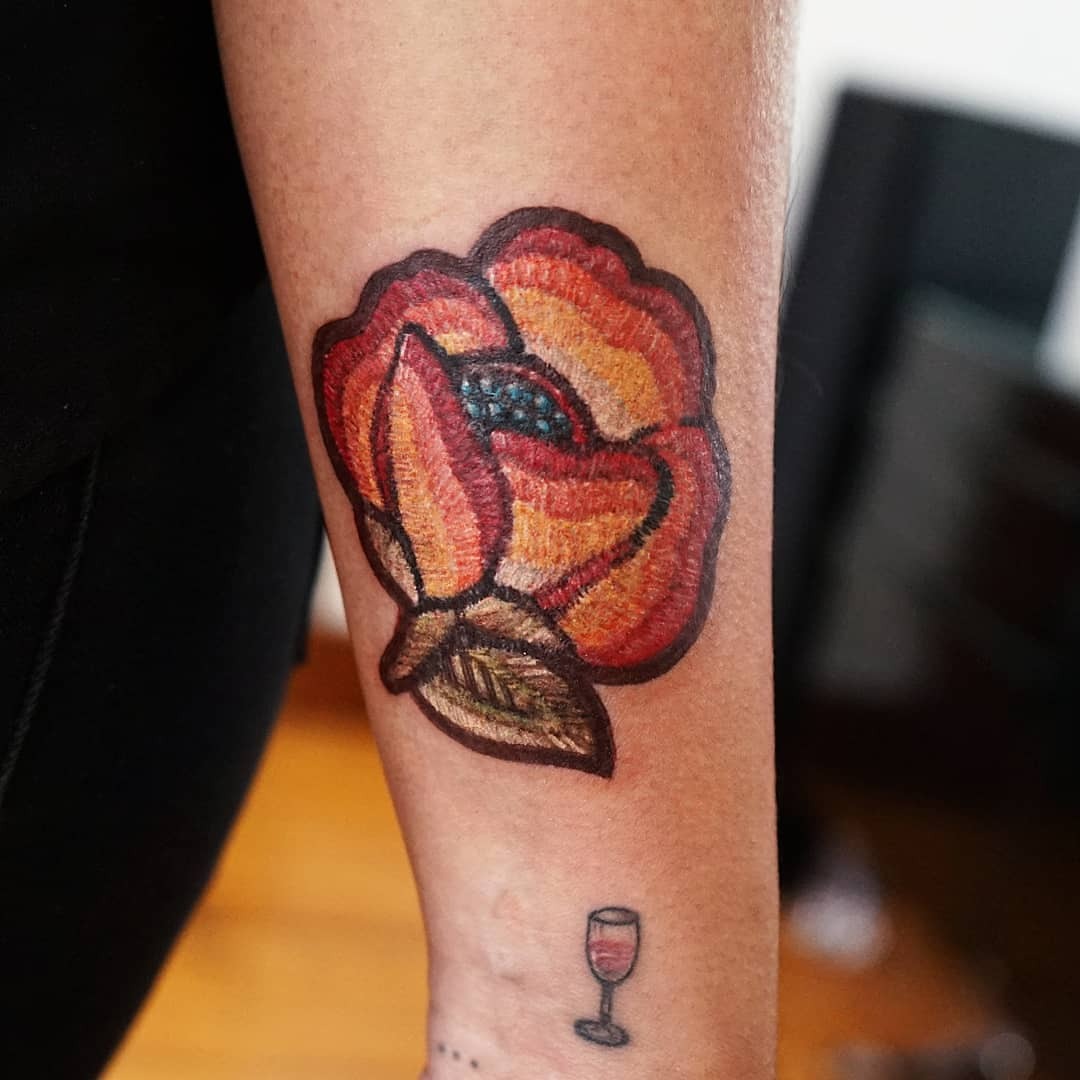 Colorful Flower Embroidery Tattoo with Leaves Tattoo Design