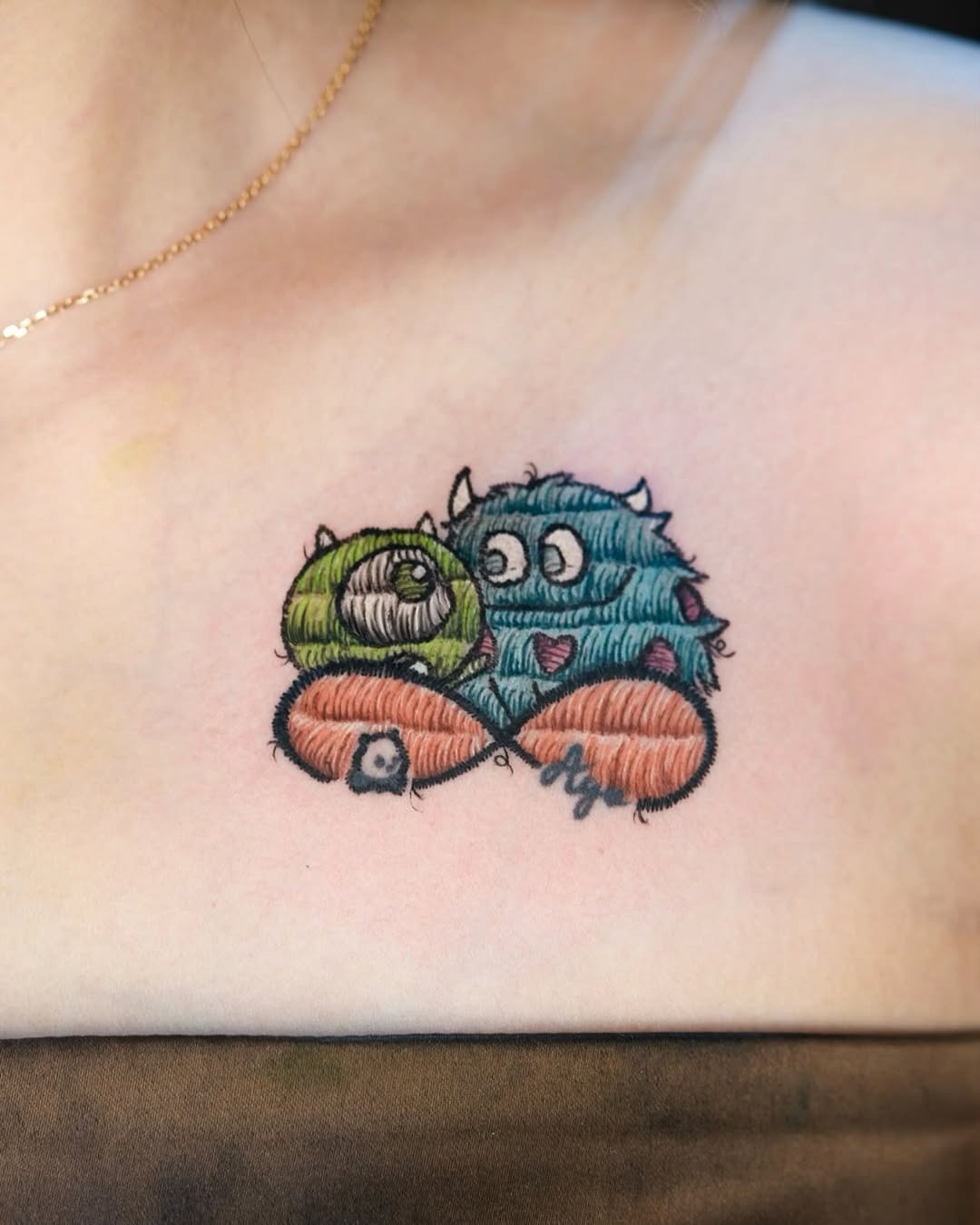 Cute stitched monster tattoos with vibrant colors Tattoo Design