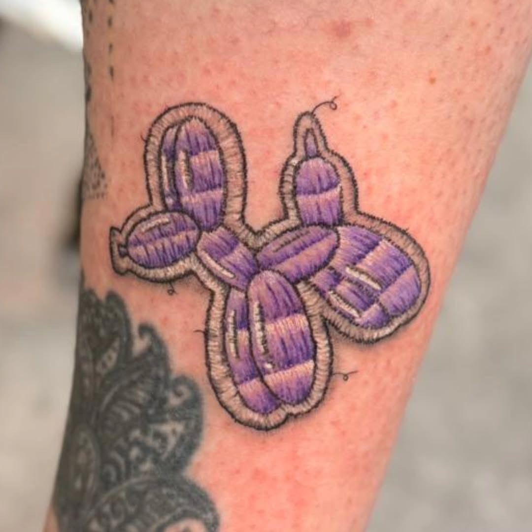 Whimsical balloon animal embroidery tattoo design Tattoo Design