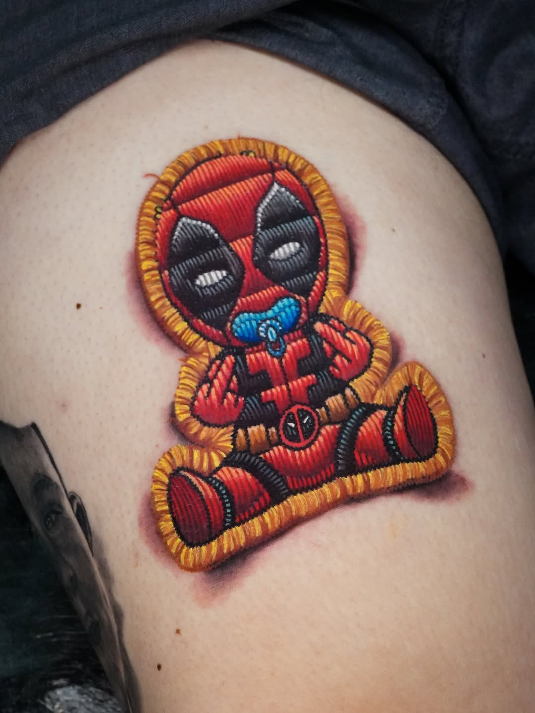Whimsical Deadpool Embroidery-Inspired Tattoo Tattoo Design