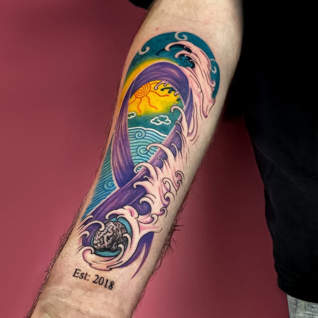 Dramatic wave tattoo symbolizing strength and awareness Tattoo Design