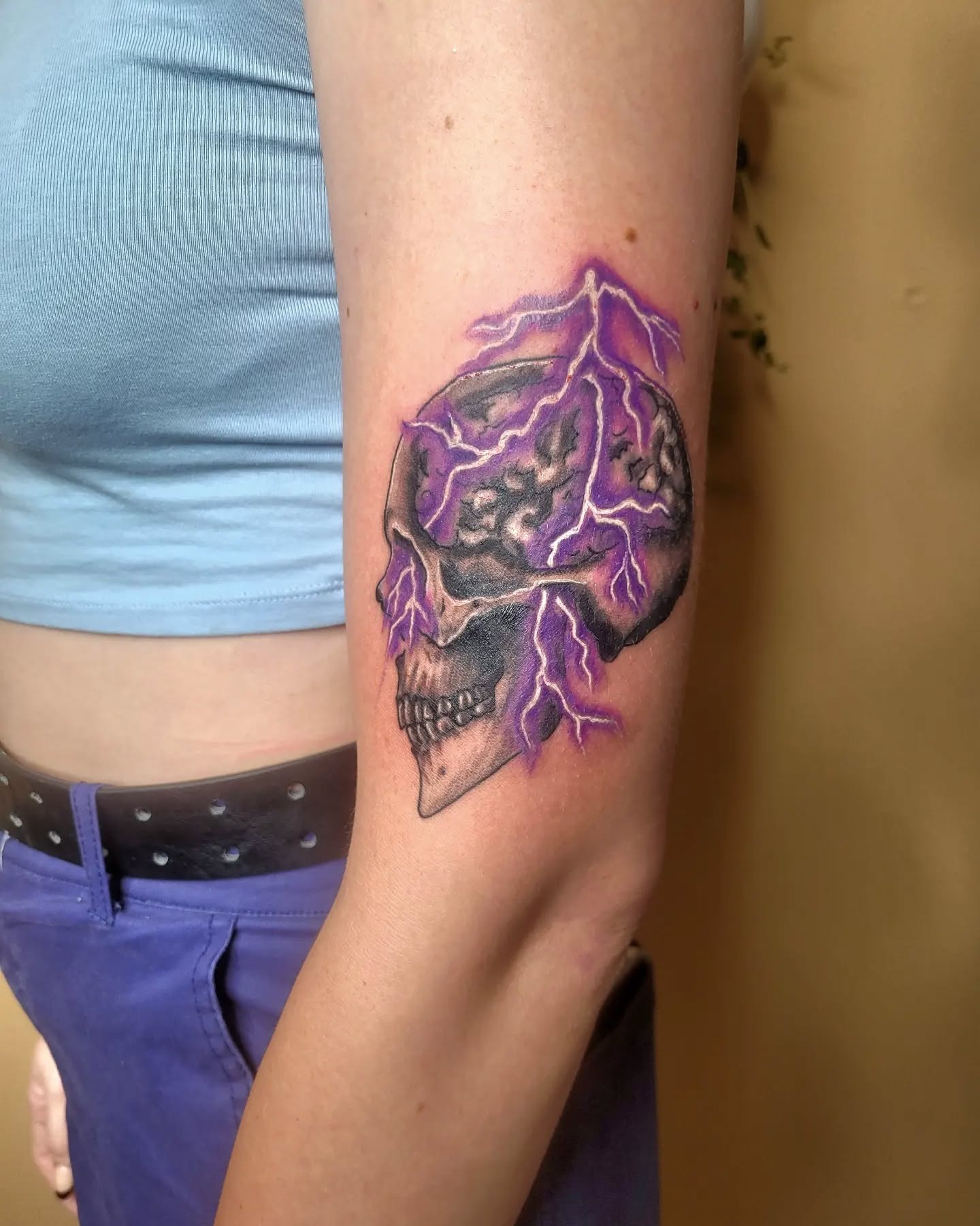 Striking skull tattoo symbolizing epilepsy awareness Tattoo Design