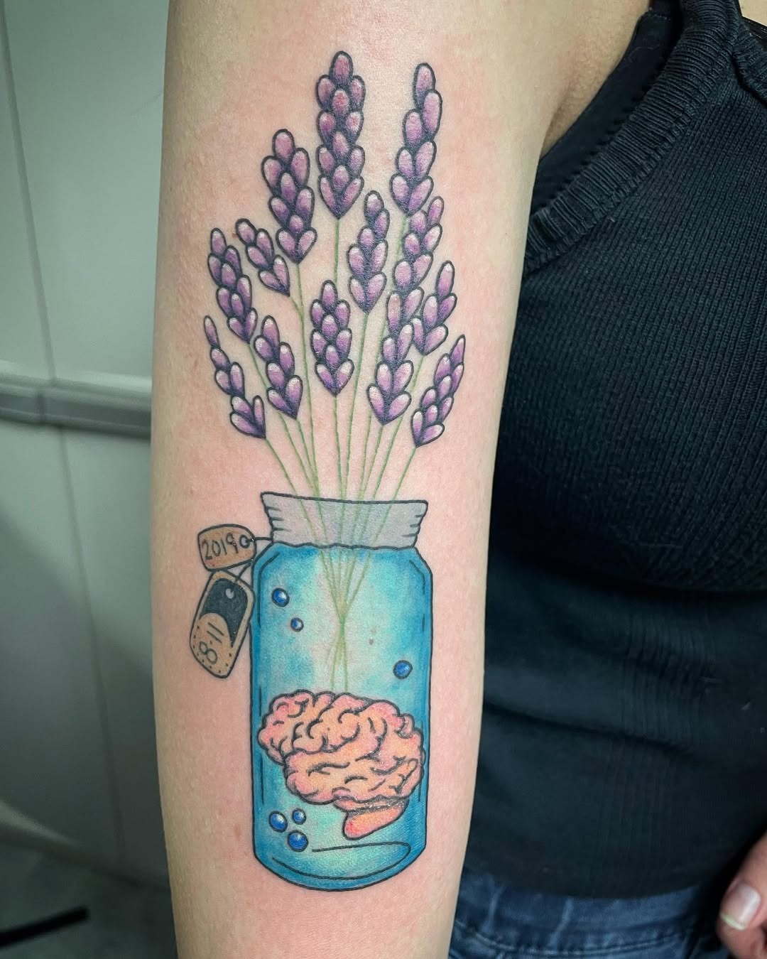 Symbolic epilepsy tattoo with brain and lavender Tattoo Design