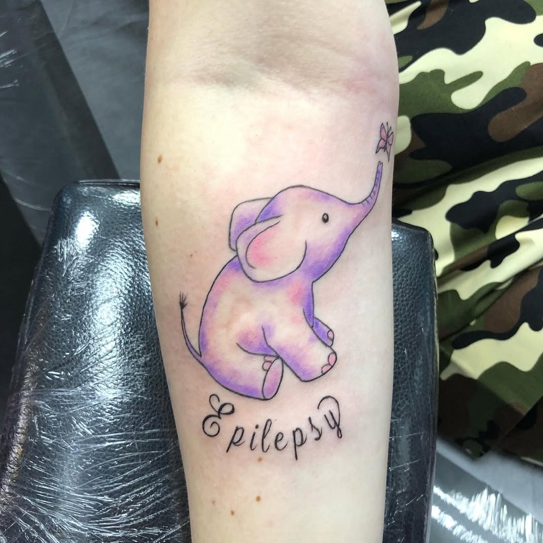 Whimsical elephant tattoo symbolizing epilepsy awareness Tattoo Design