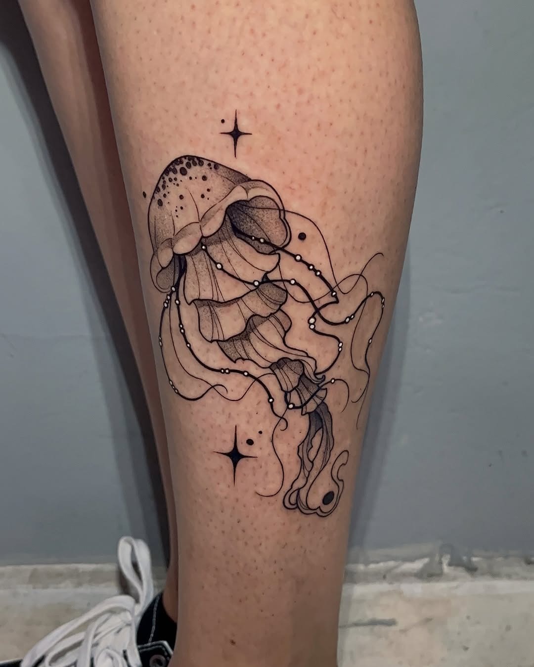 Intricate jellyfish tattoo with cosmic elements Tattoo Design