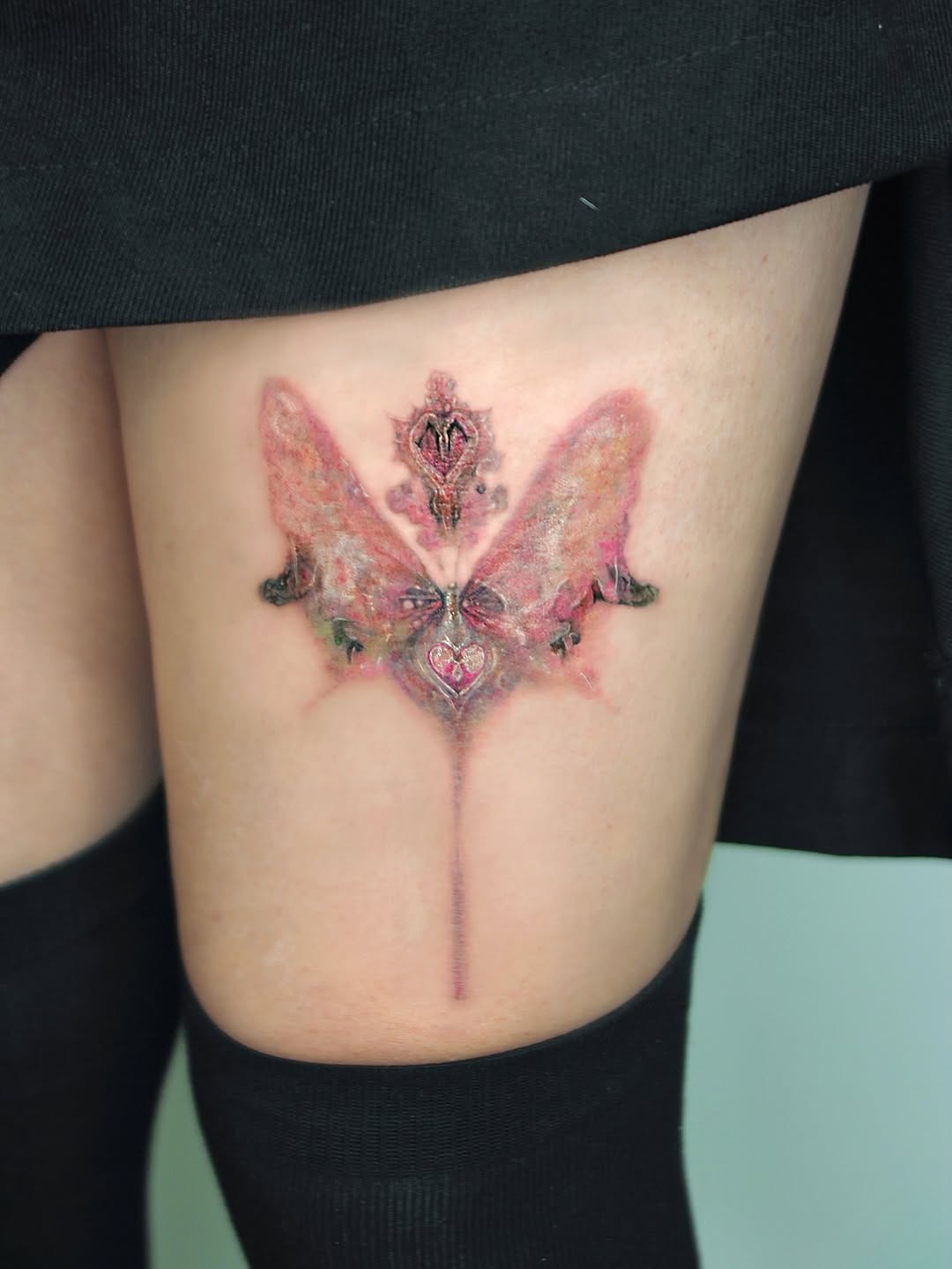 Stunning ethereal butterfly tattoo with intricate details Tattoo Design