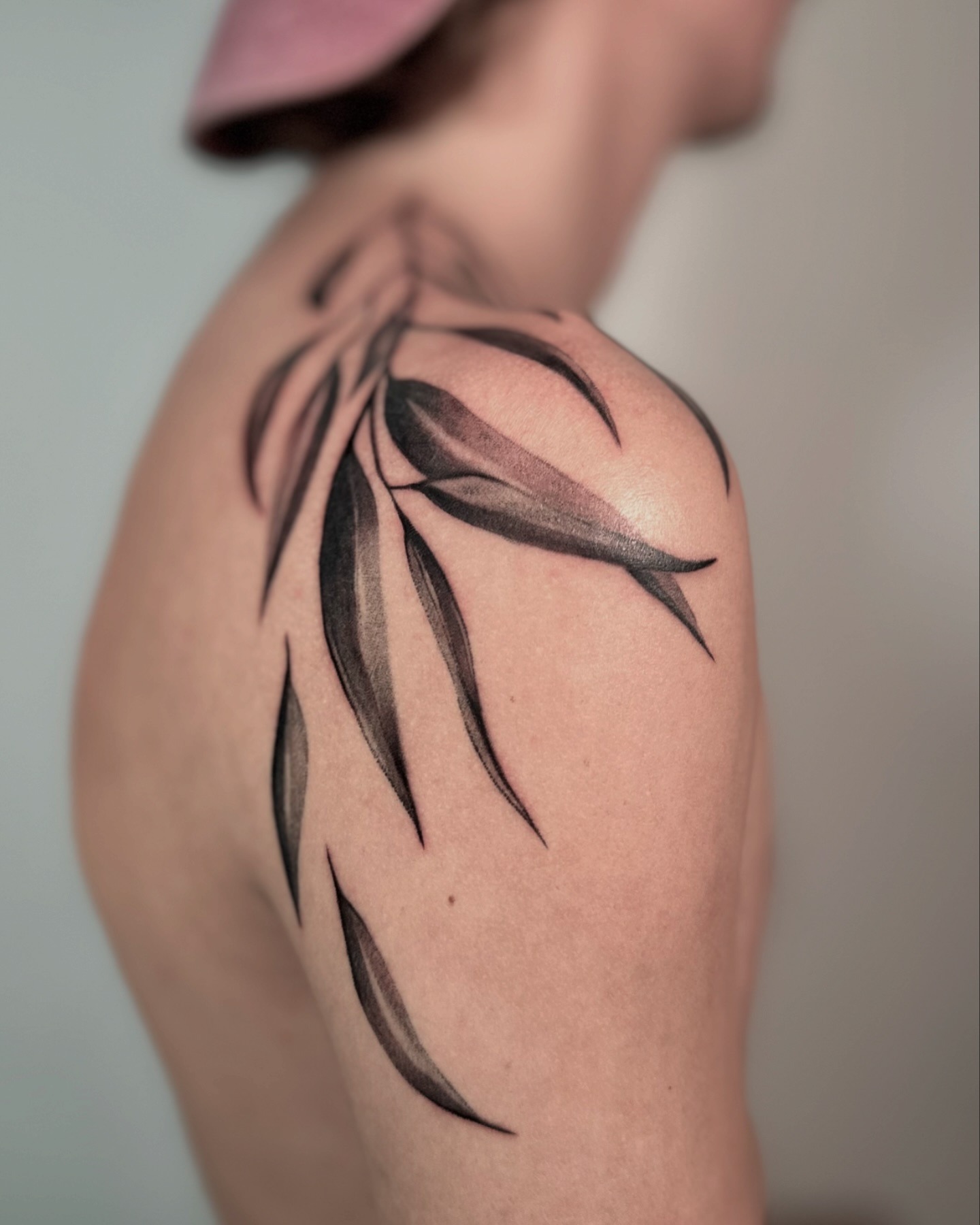 Artistic eucalyptus design on shoulder Tattoo Design