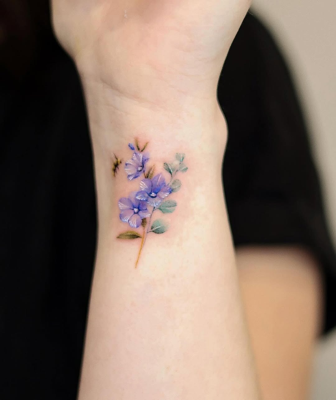 Delicate eucalyptus flower tattoo on the wrist Tattoo Design