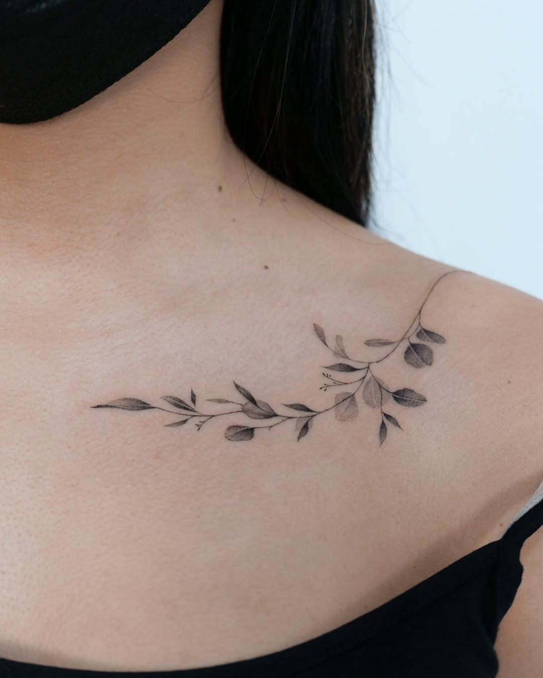 Delicate eucalyptus tattoo on shoulder for a subtle vibe Tattoo Design