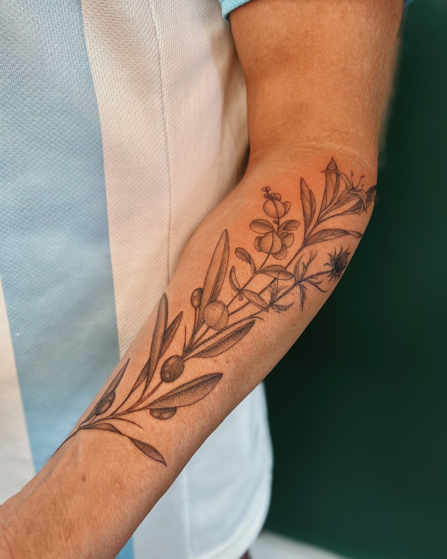 Elegant eucalyptus design on the forearm Tattoo Design
