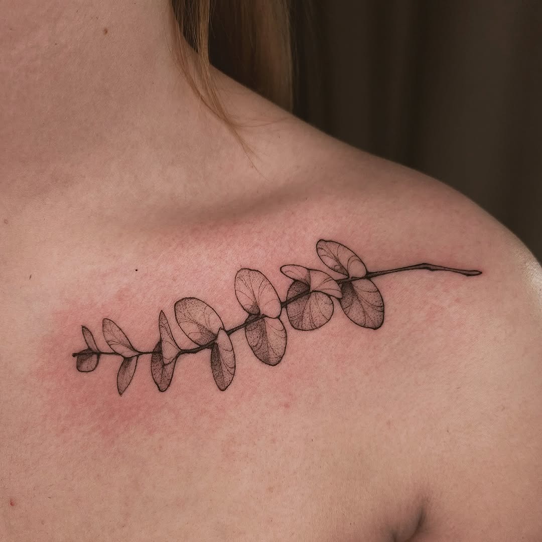 Elegant eucalyptus tattoo adorning the shoulder Tattoo Design