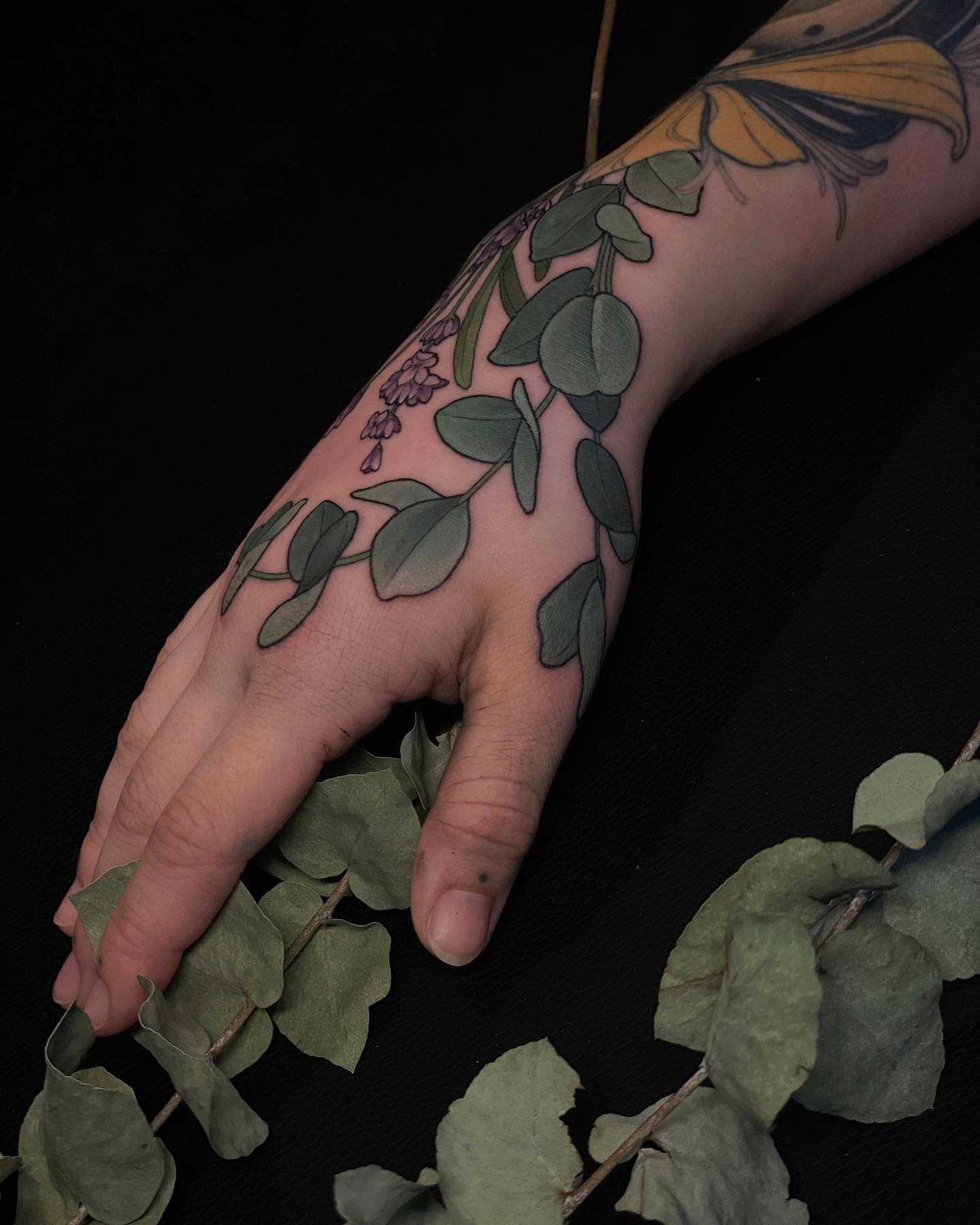 Intricate Hand Tattoo of Eucalyptus Leaves Tattoo Design
