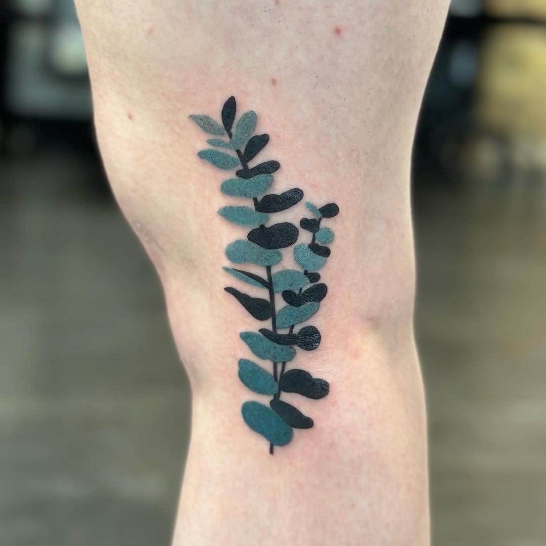 Stylish eucalyptus tattoo with elegant leaf design Tattoo Design