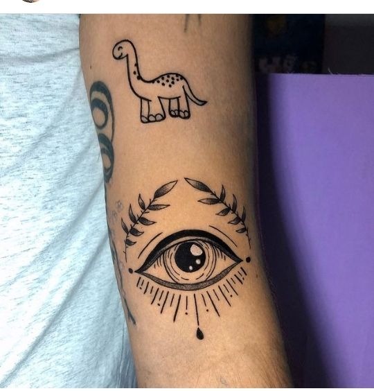 Classic Blackwork Evil Eye With Leaf Crown Tattoo Design