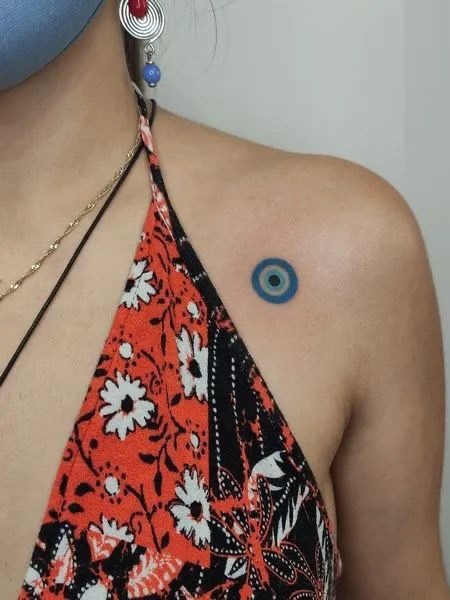 Small Blue Evil Eye on the Shoulder Tattoo Design
