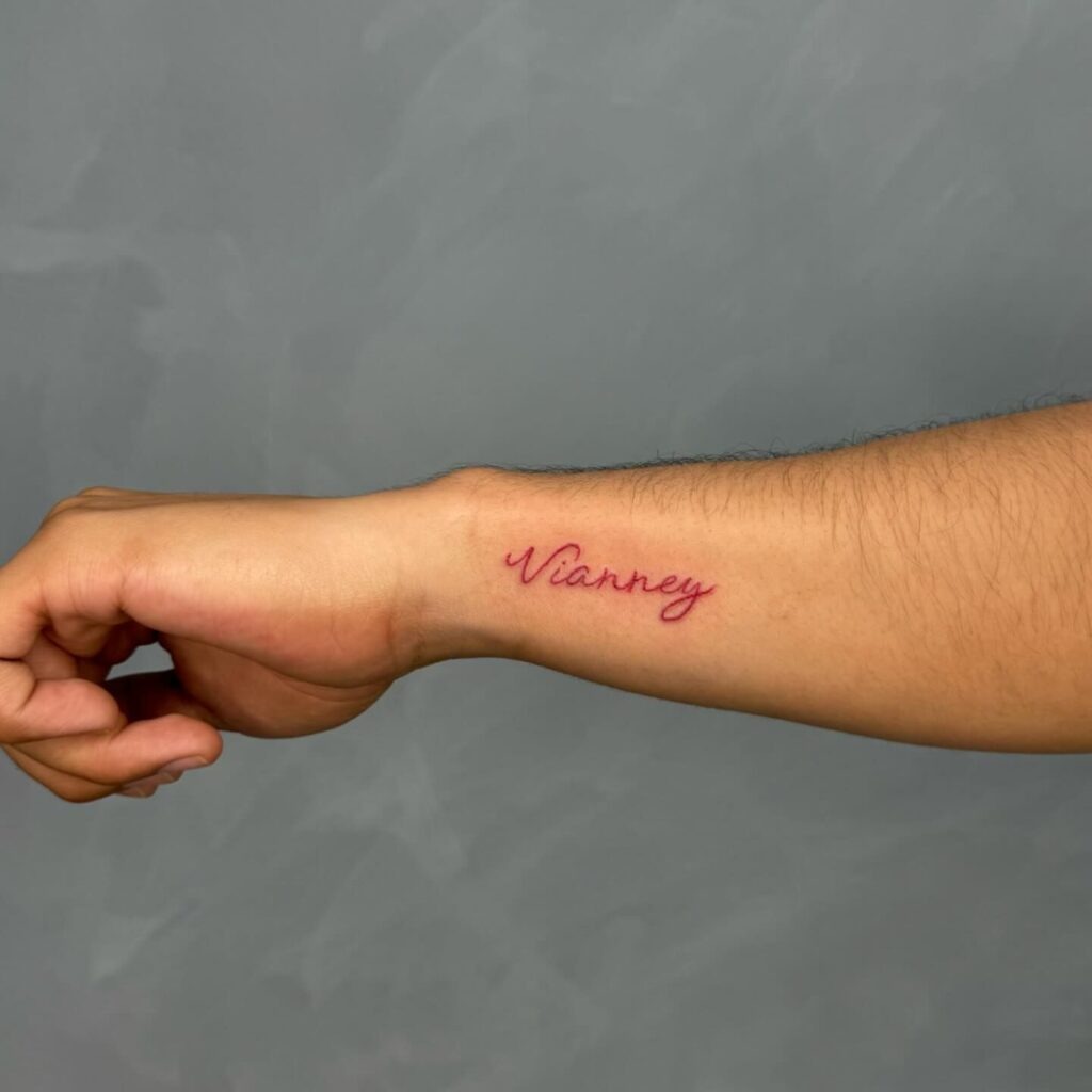 Red Script Forearm Tattoo Tattoo Design