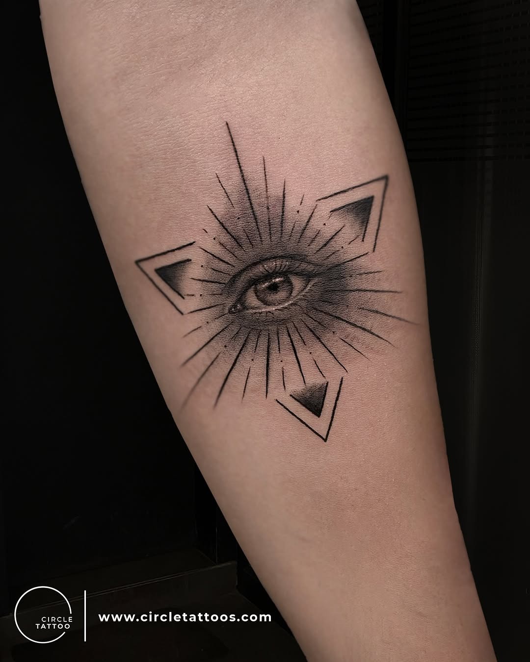 Intricate eye tattoo with geometric flair Tattoo Design