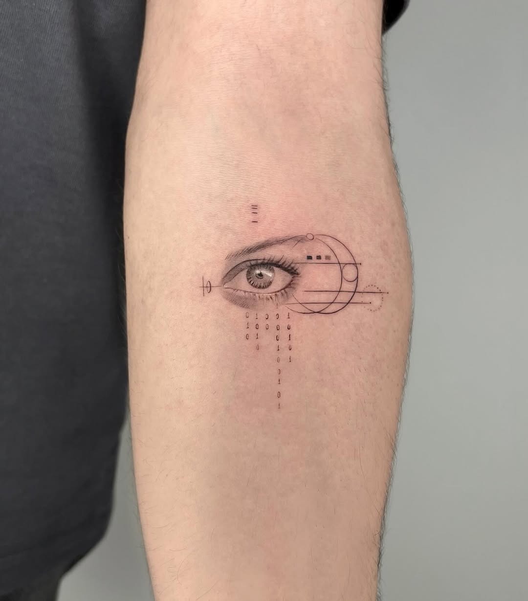 Intricate geometric eye tattoo on forearm Tattoo Design
