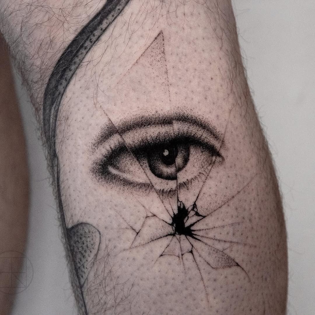 Intriguing cracked eye tattoo design Tattoo Design