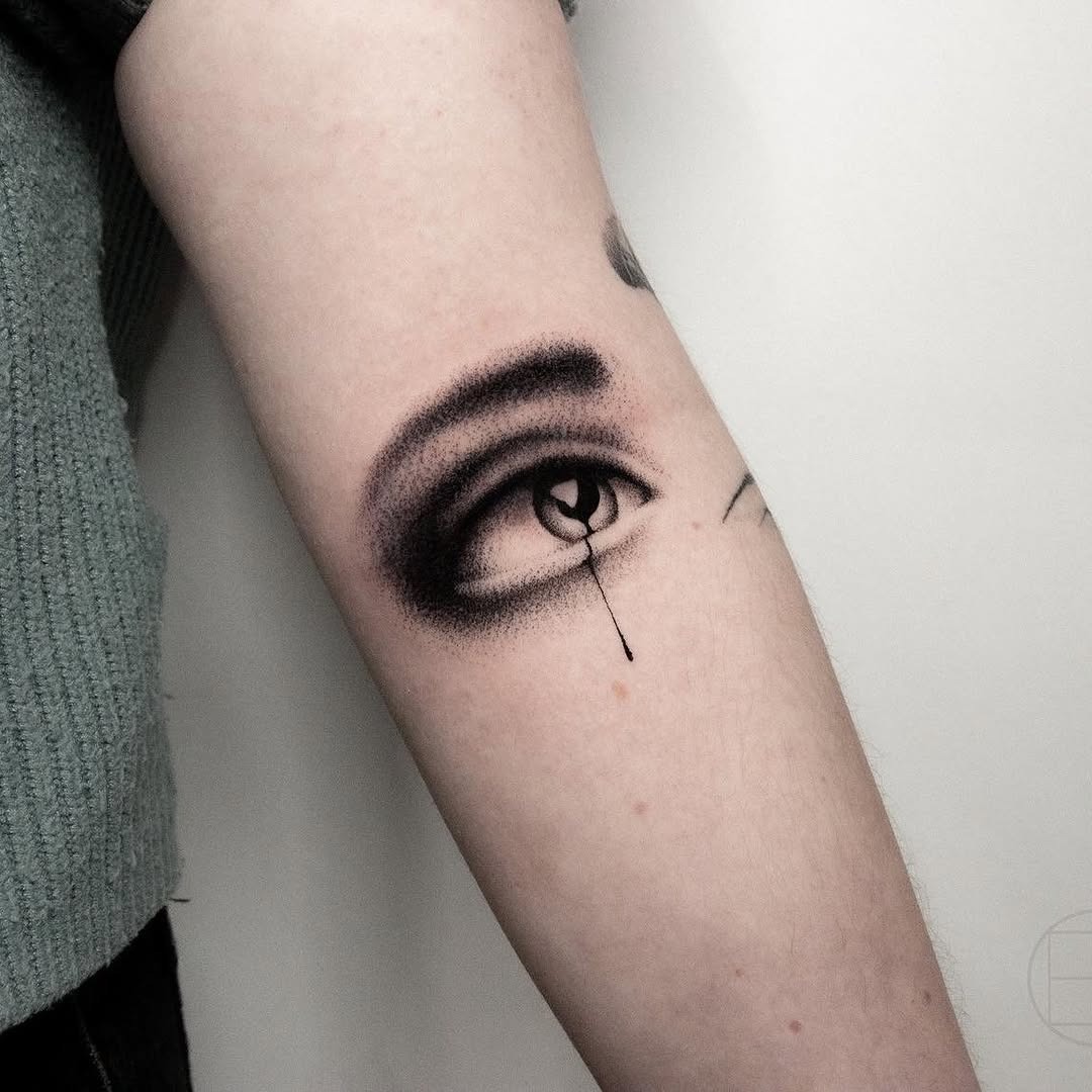Realistic eye tattoo with dramatic shading Tattoo Design