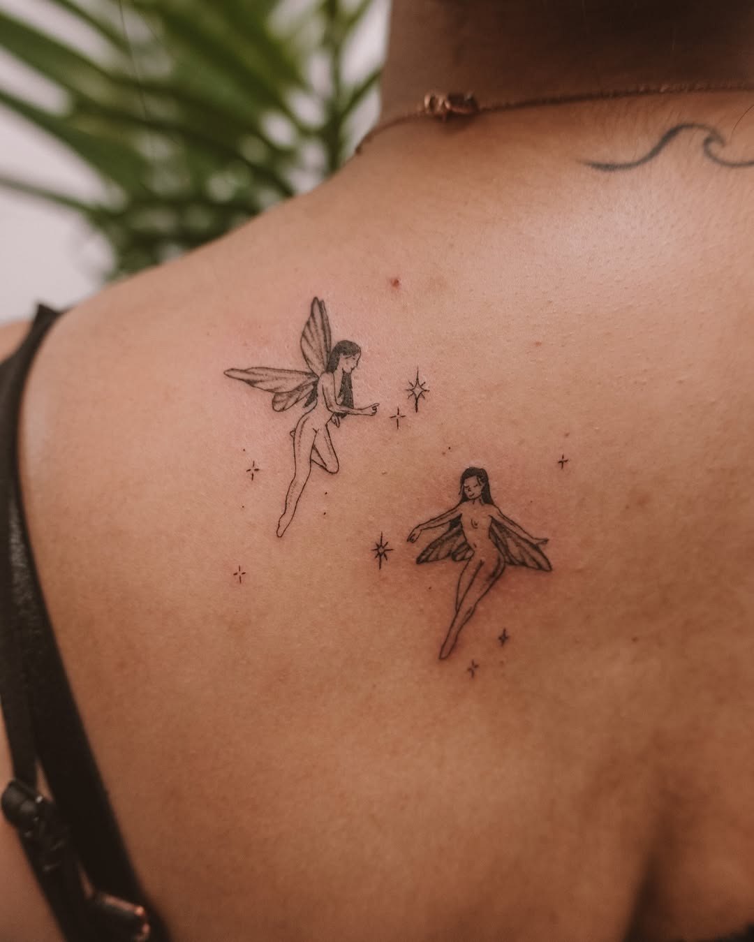 Enchanting fairy tattoo design on the back Tattoo Design