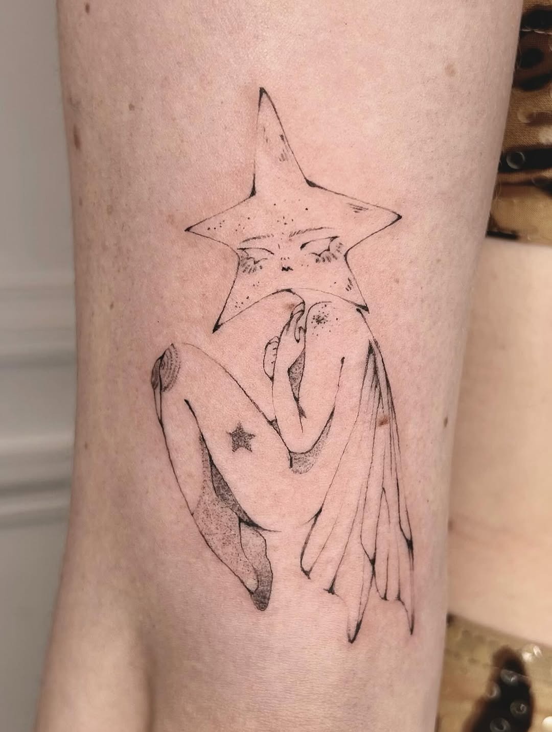Minimalist fairy tattoo with a star theme Tattoo Design