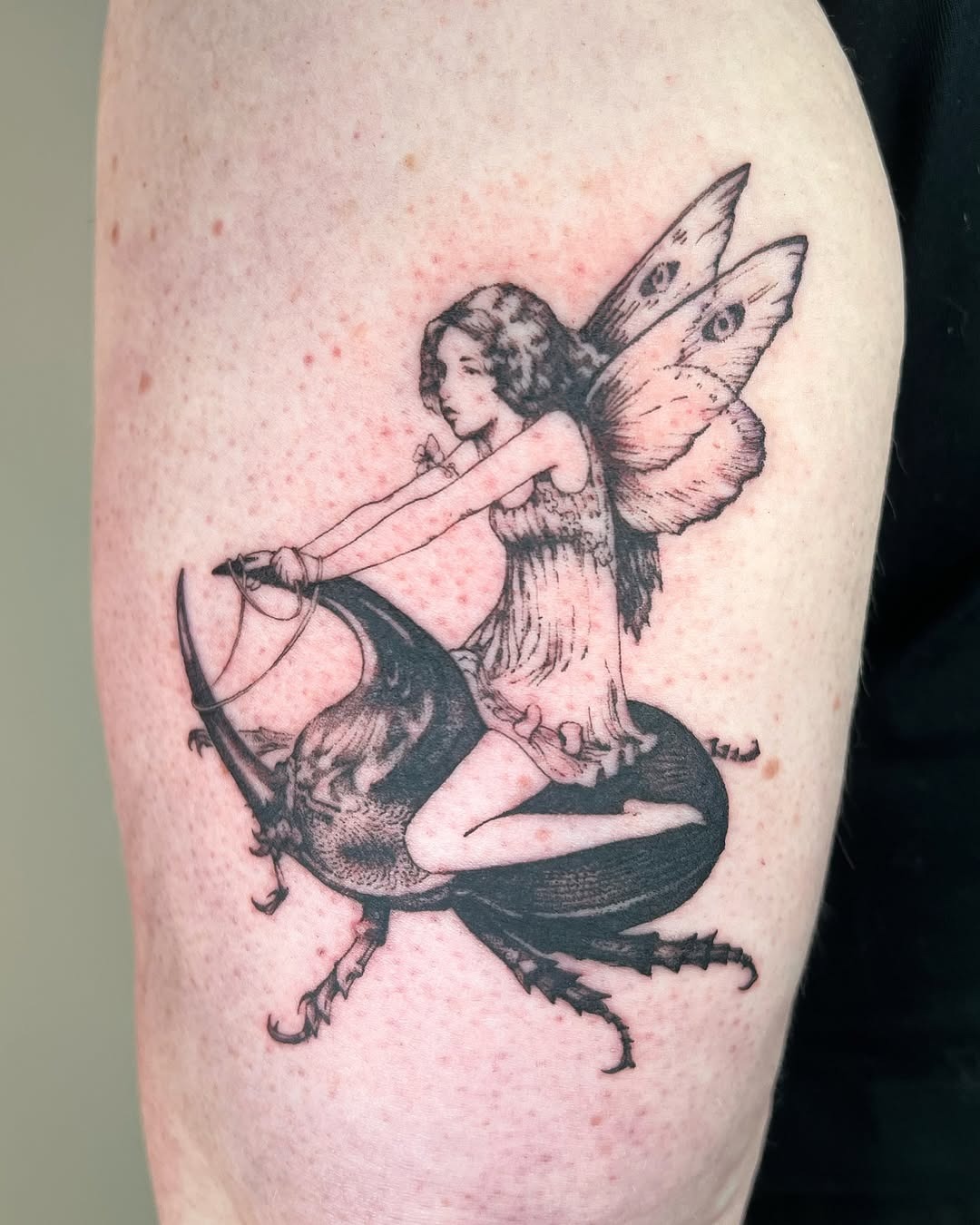 Whimsical fairy riding a beetle tattoo Tattoo Design
