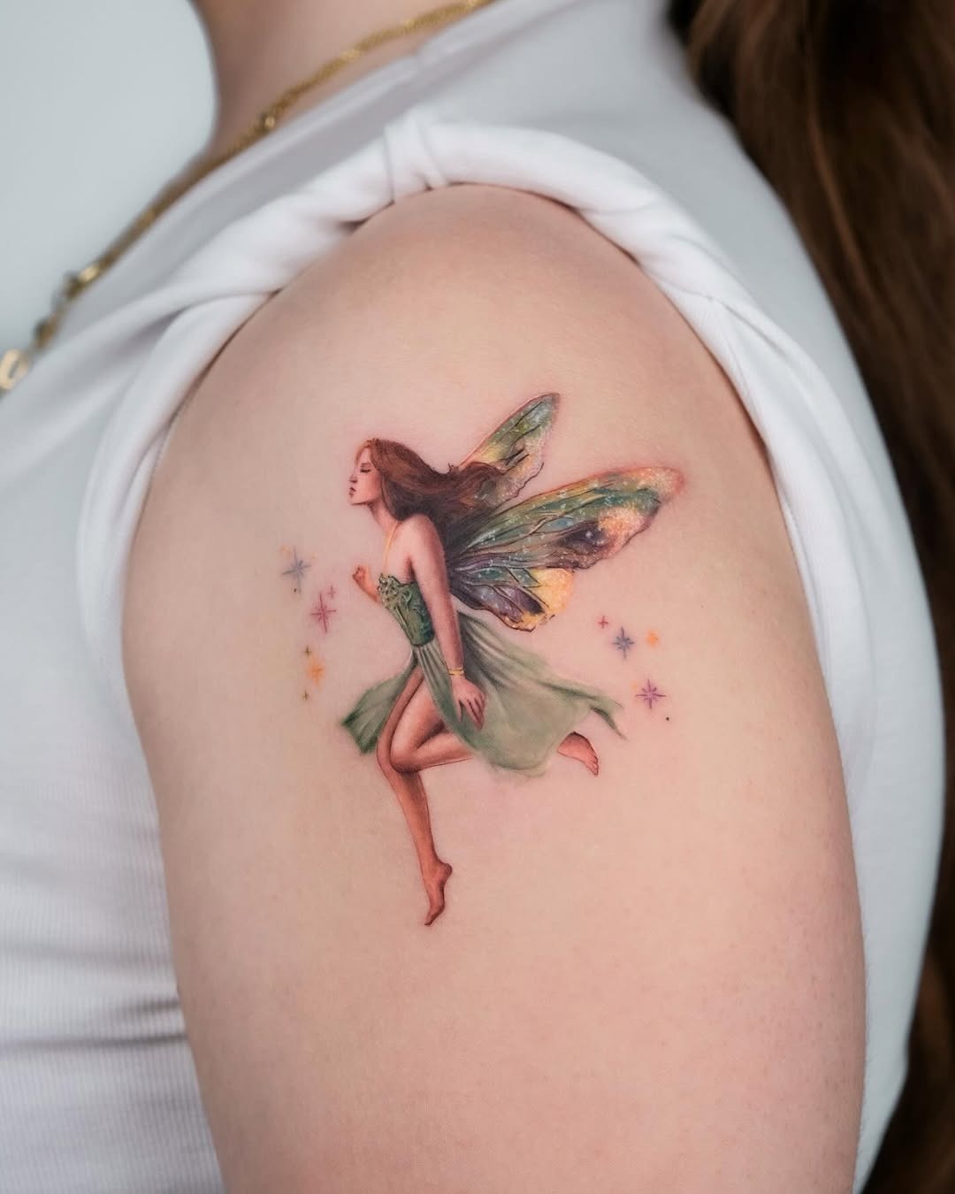 Whimsical fairy tattoo brings magic to life Tattoo Design