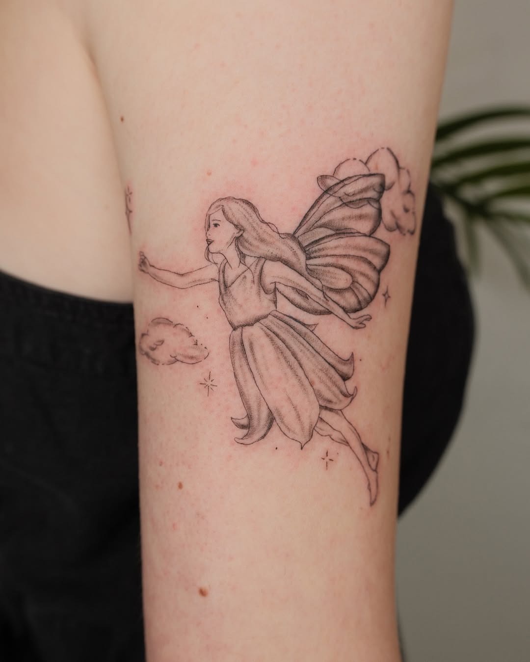 Whimsical Fairy Tattoo on Arm Tattoo Design