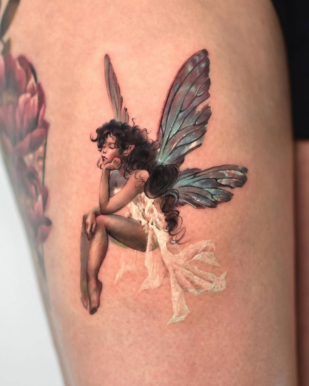 Whimsical fairy tattoo showcasing ethereal beauty Tattoo Design