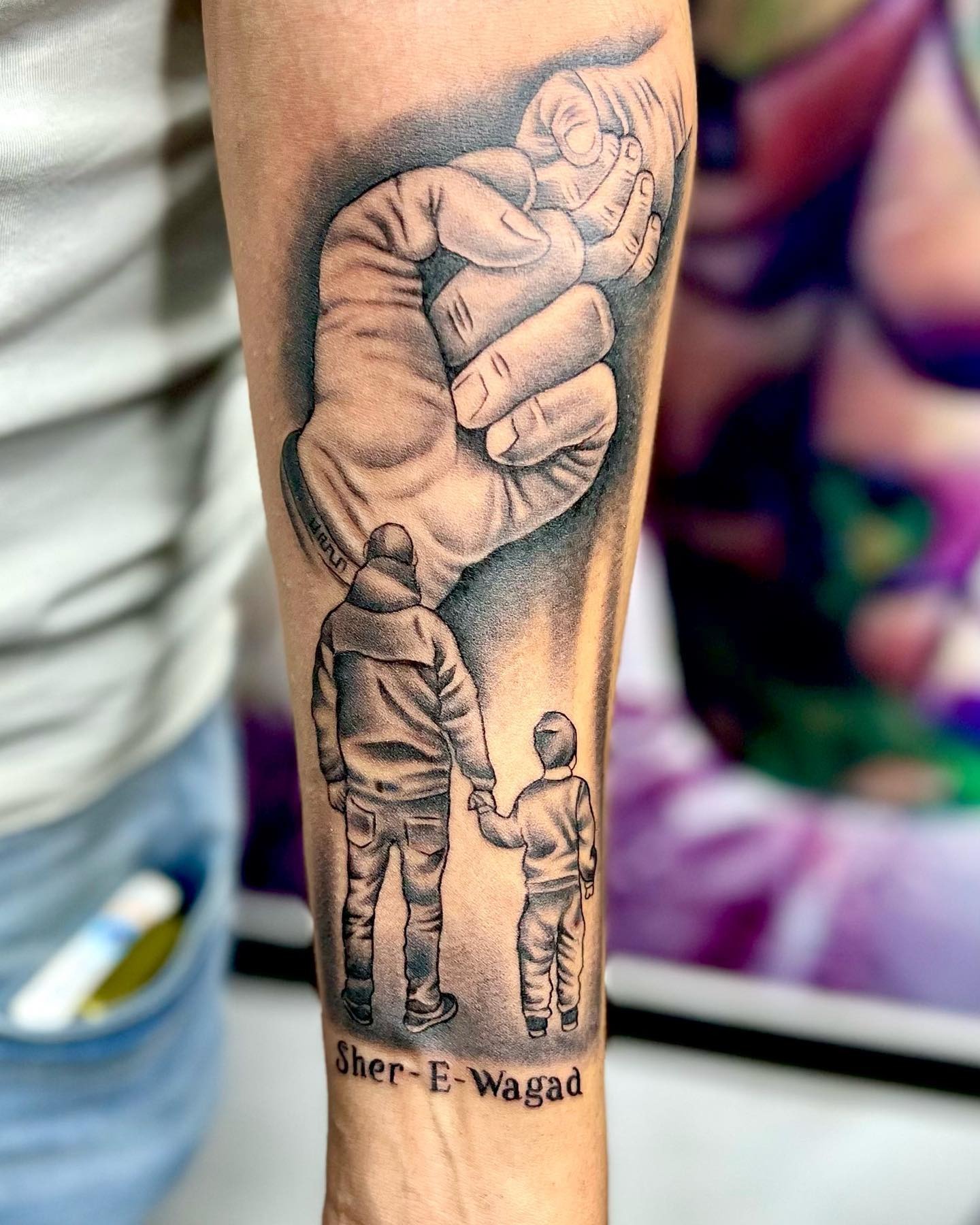 Father and Son Guiding Hand Tattoo Tattoo Design