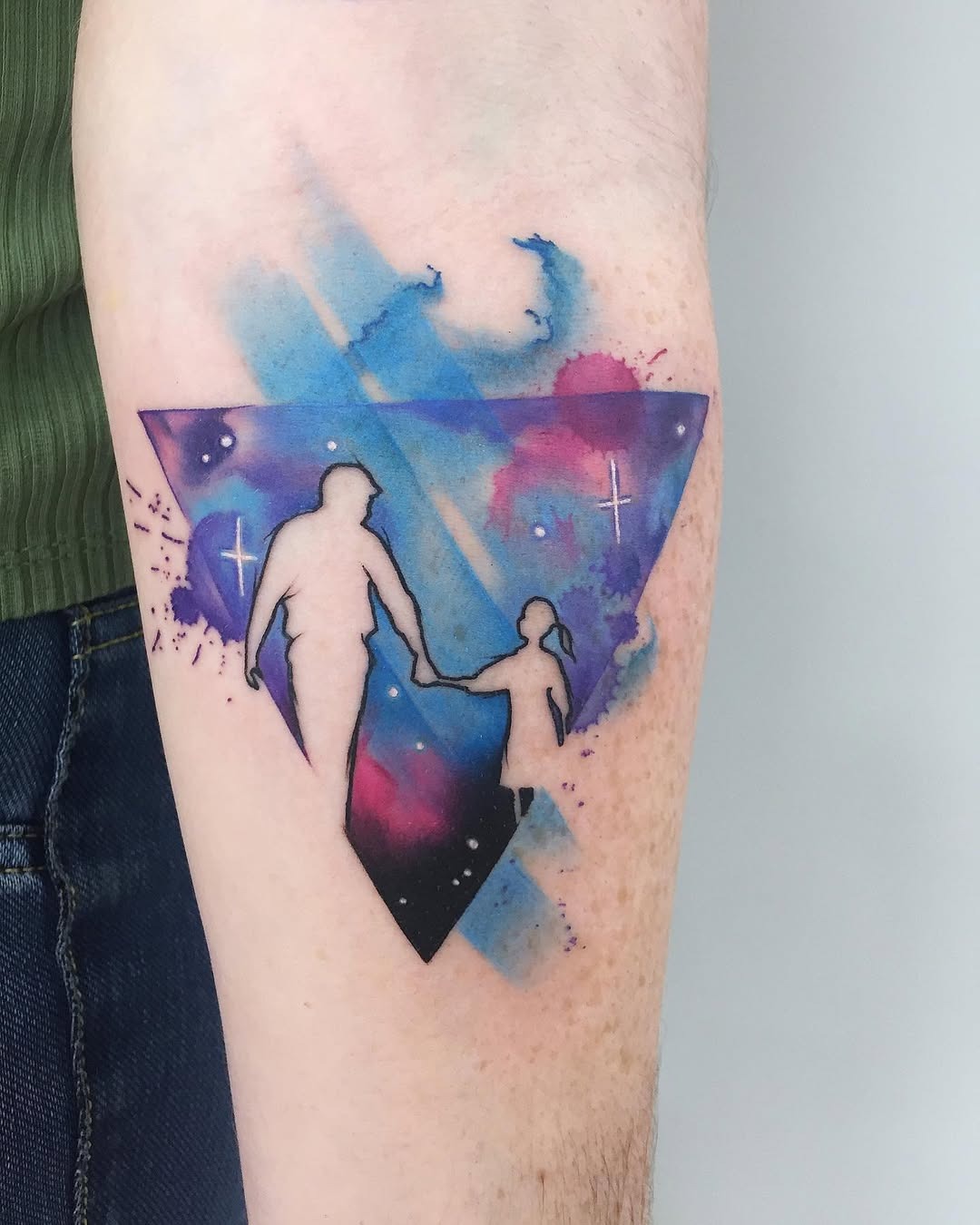 Heartwarming father-daughter silhouette in galaxy design Tattoo Design
