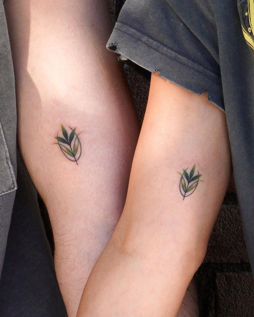Minimalist leafy tattoos for father and daughter Tattoo Design