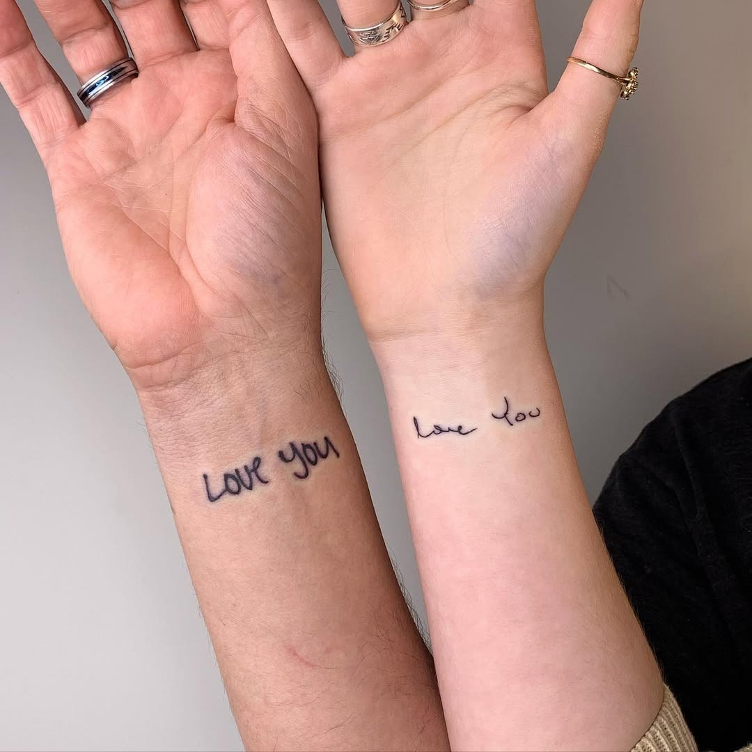 Simple love tattoos between father and daughter Tattoo Design