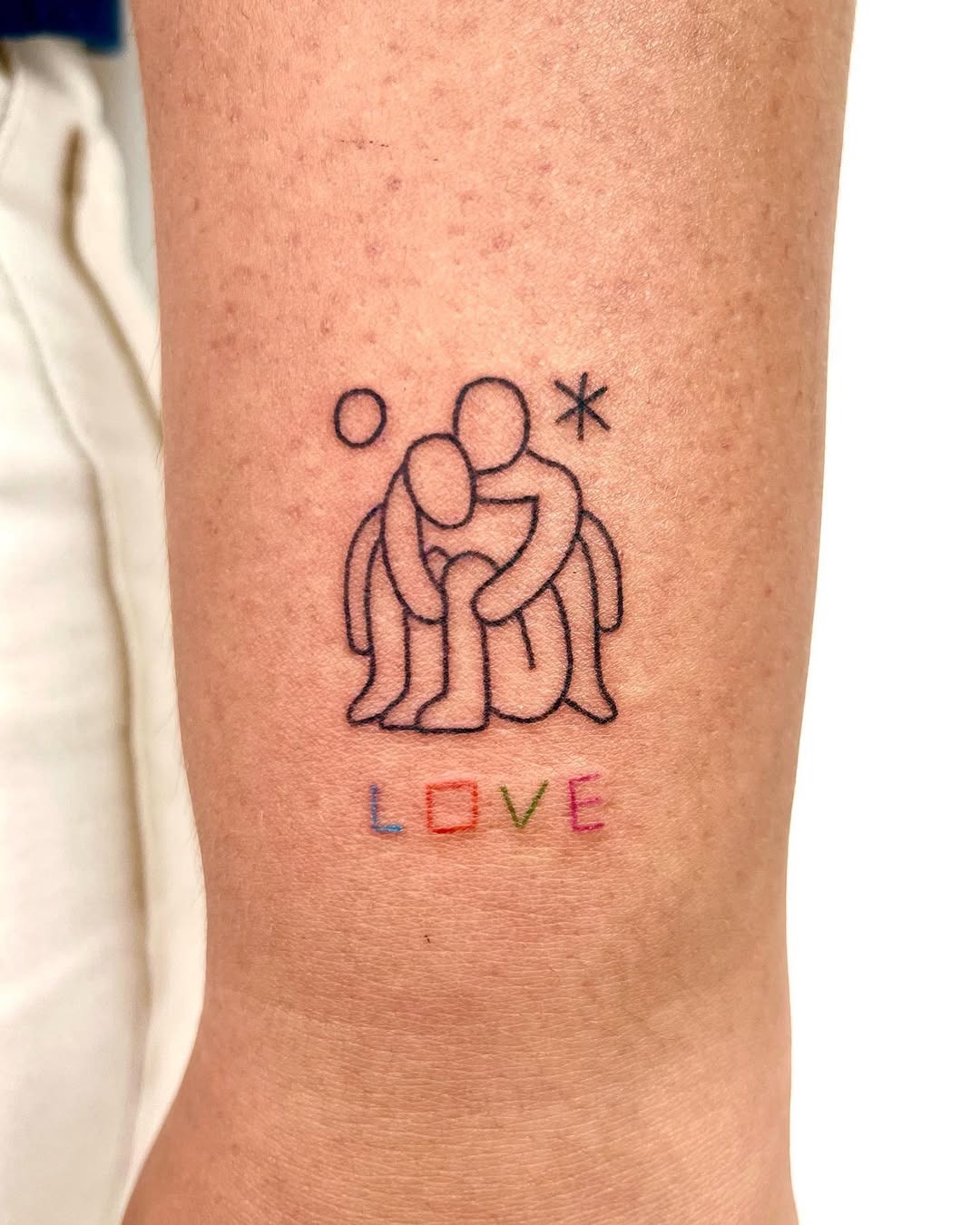 Stylized father-daughter moment captured in ink Tattoo Design