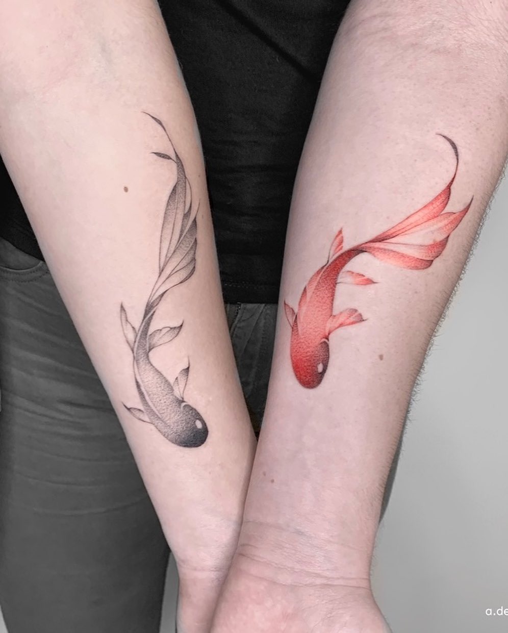 Symbolic fish tattoos for father and daughter Tattoo Design