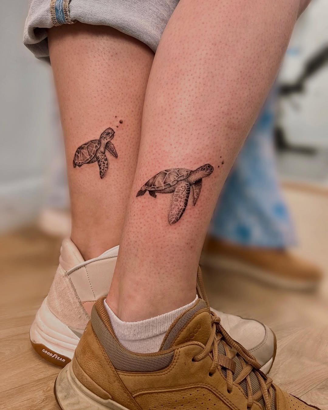 Symbolic turtle tattoos for father and daughter Tattoo Design