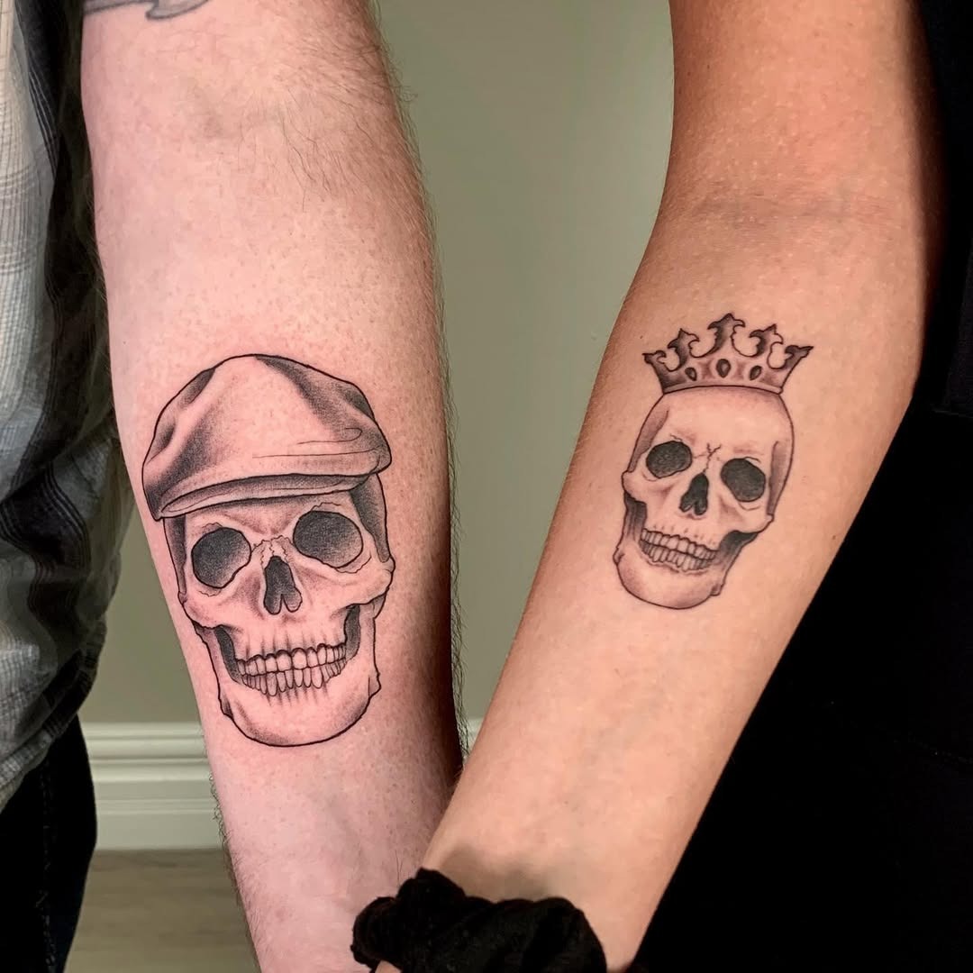 Unique father-daughter skull tattoo duo shown here Tattoo Design
