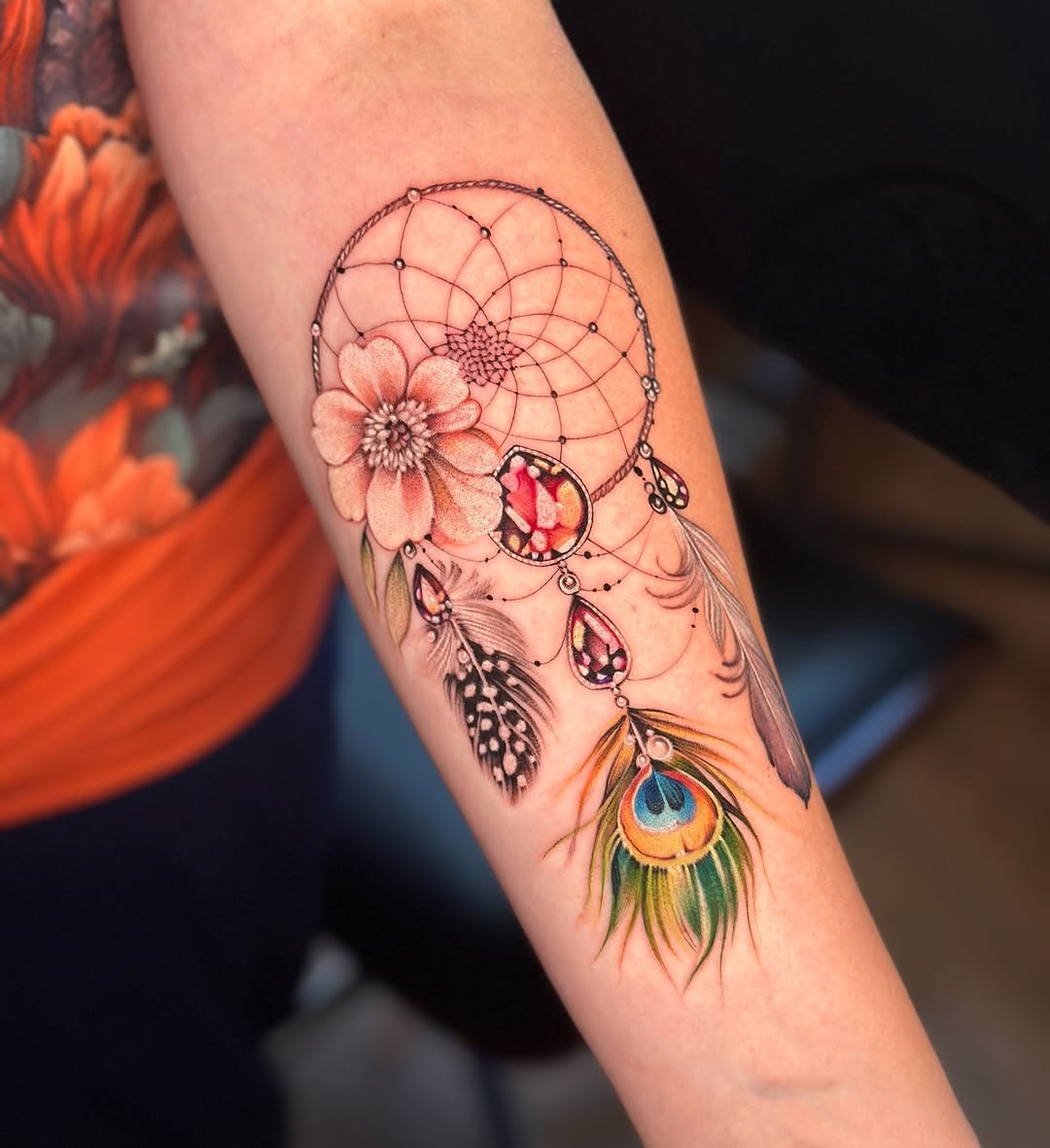 Colorful dreamcatcher inspired feather tattoos Tattoo Design