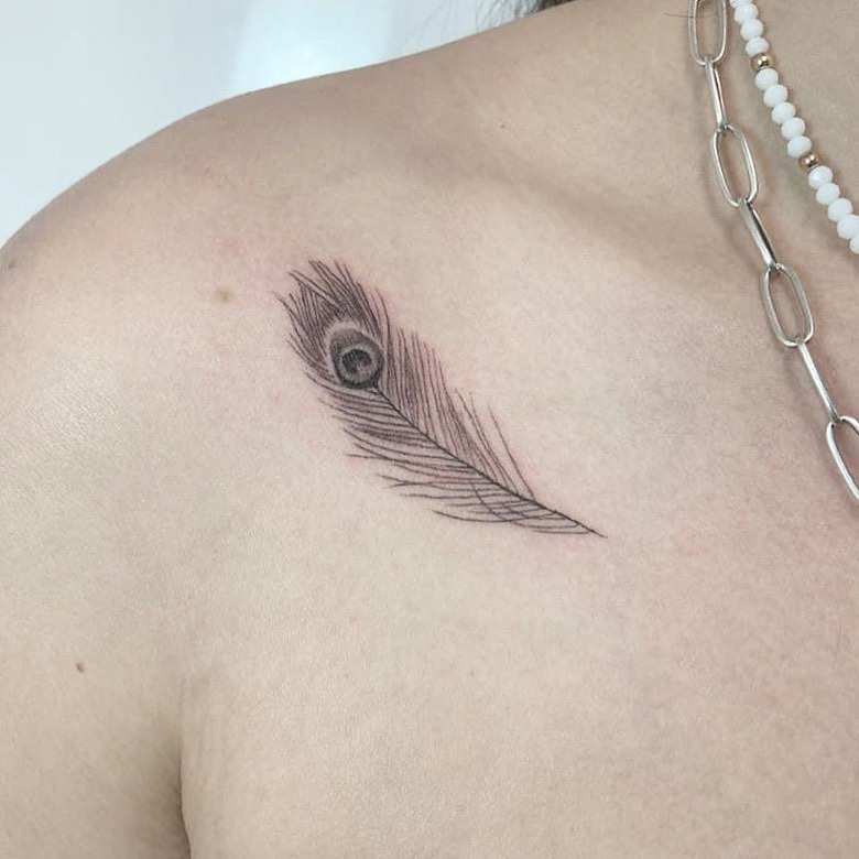Elegant shoulder peacock feather tattoo design Tattoo Design
