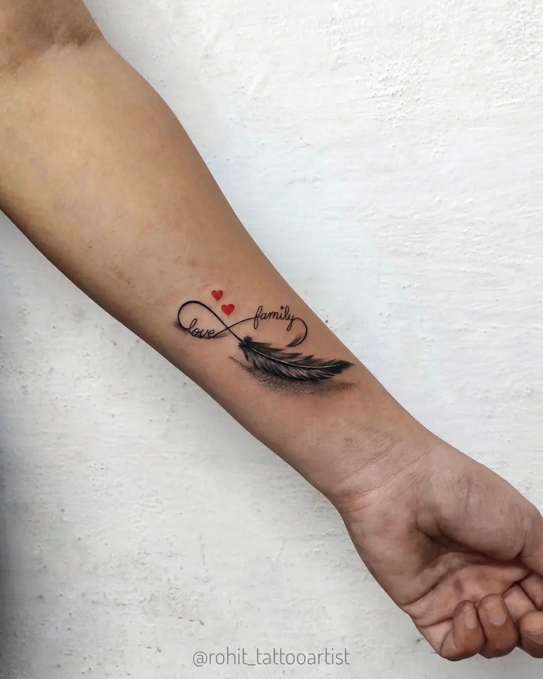 Meaningful feather tattoo with infinity love. Tattoo Design