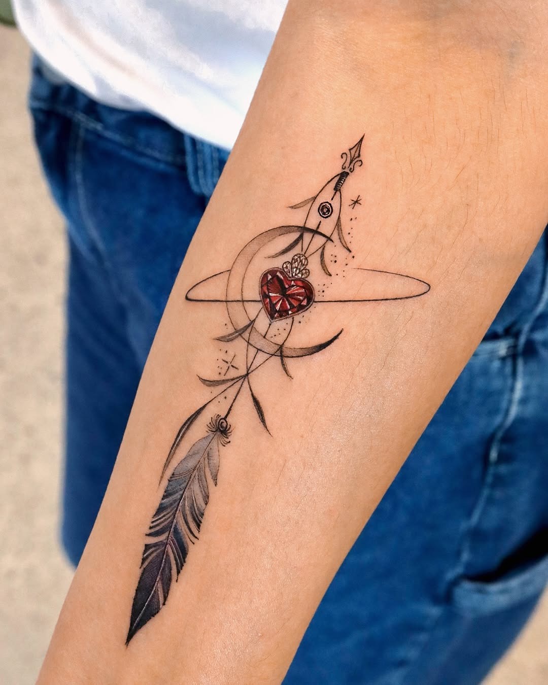 Unique feather and heart tattoo design Tattoo Design