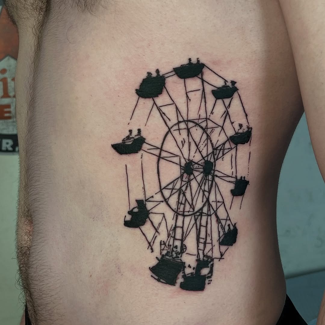 Artistic Ferris Wheel Tattoo on Rib Tattoo Design