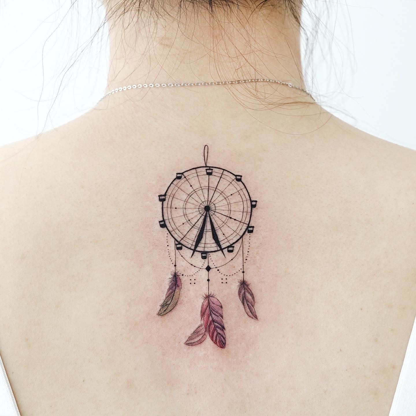 Charming Ferris Wheel Tattoo with Feathers Tattoo Design