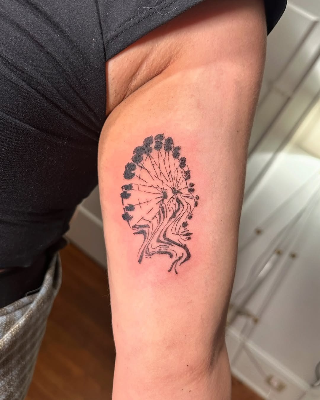 Elegant Ferris Wheel Tattoo on Arm Tattoo Design